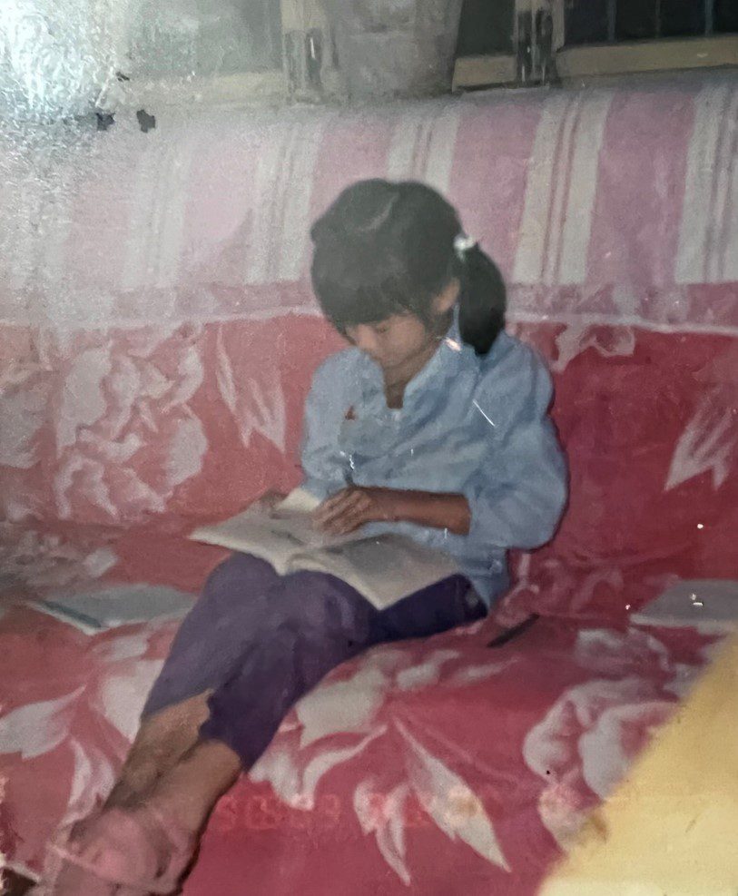 Photograph of child reading Photograph of child reading
