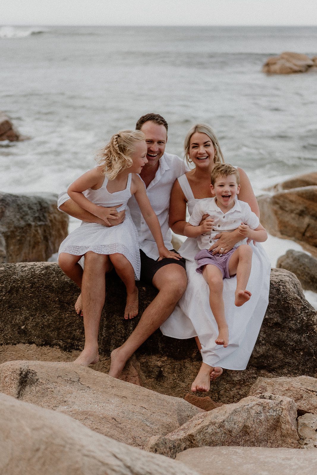 Photograph of family at beach Photograph of family at beach